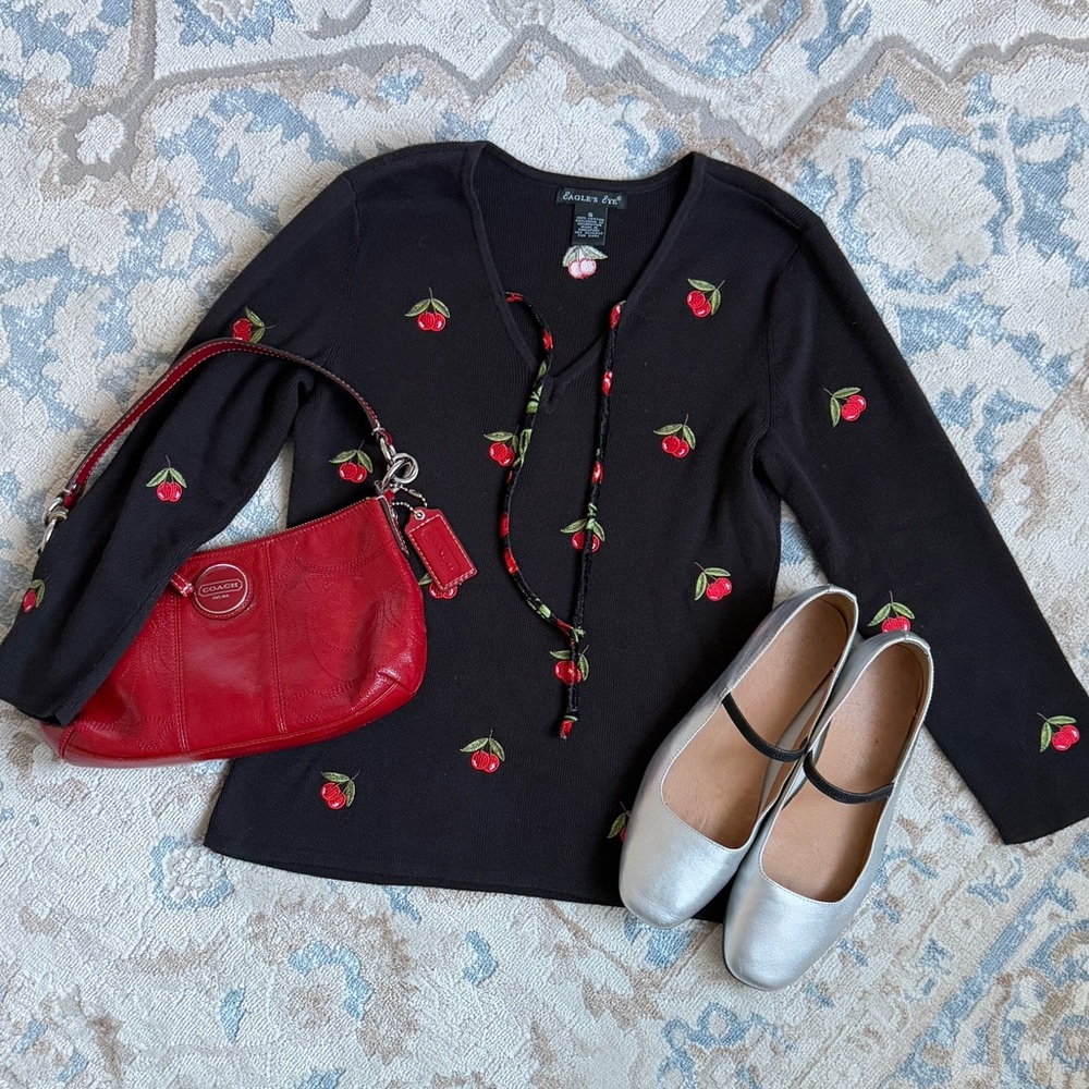 Black long sleeve Y2K vibes top with red cherries and a tie front detail size S